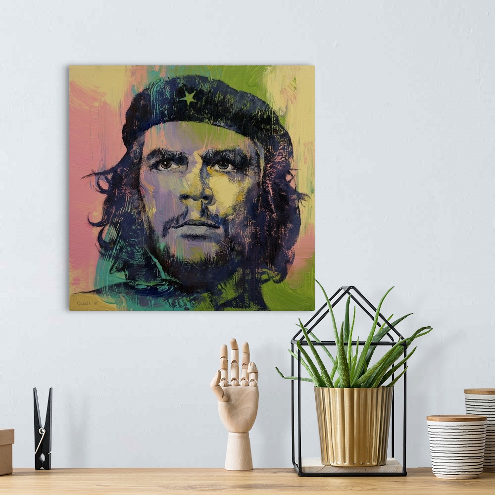 A bohemian room featuring A contemporary painting of a portrait of a Che Guevara