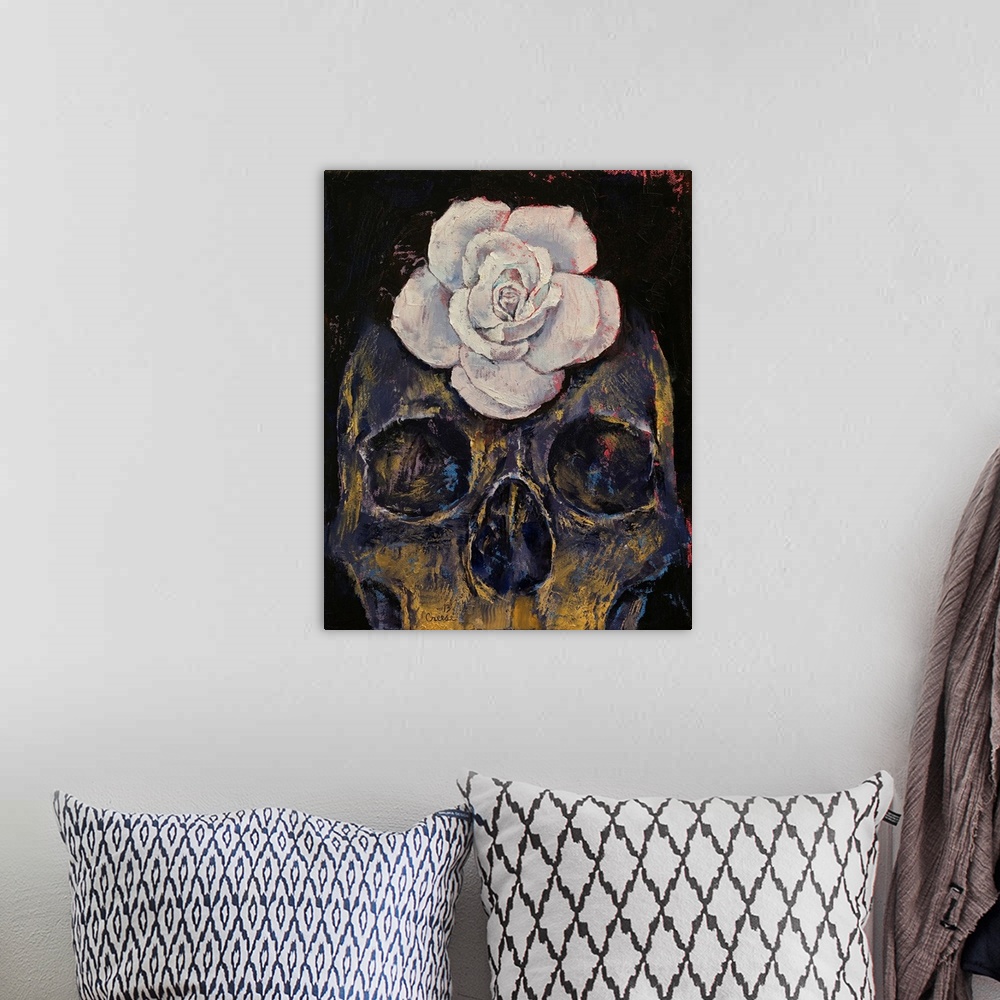 A bohemian room featuring A contemporary painting of a human skull with a white flower on the forehead.