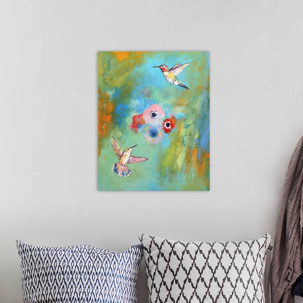 A bohemian room featuring A contemporary painting of hummingbirds flying around pink flowers.