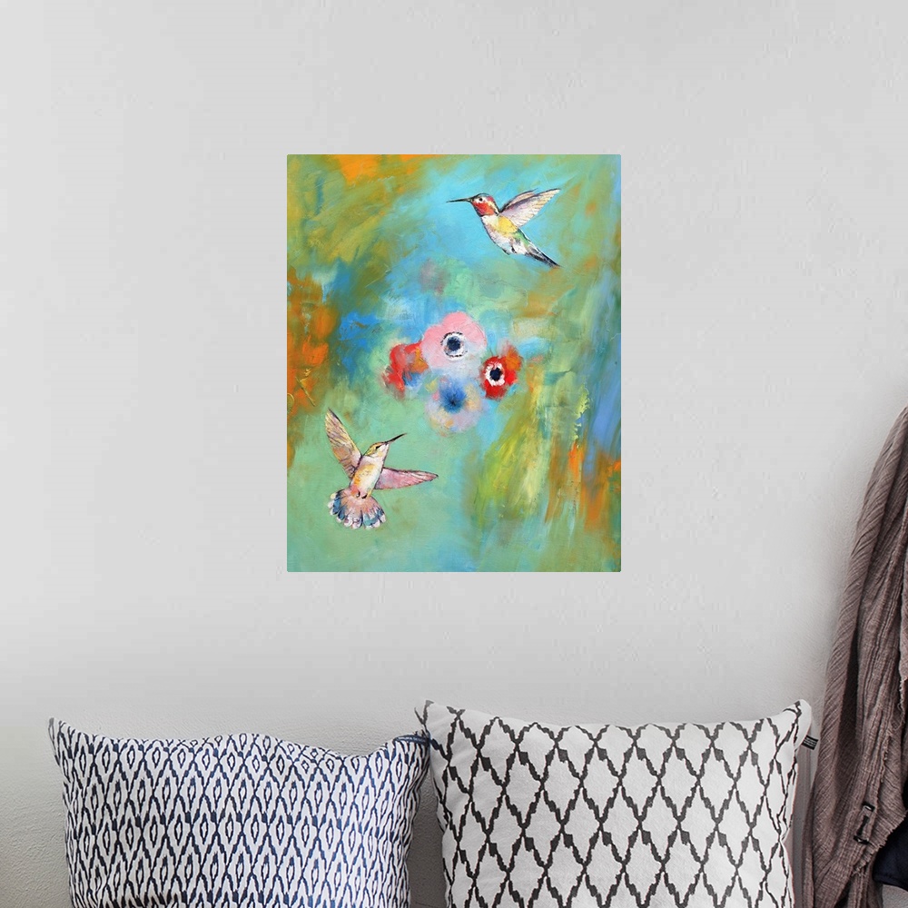 A bohemian room featuring A contemporary painting of hummingbirds flying around pink flowers.