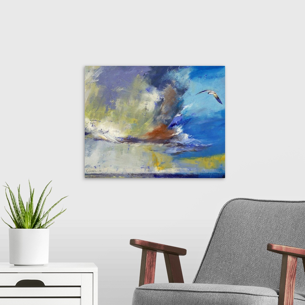 A modern room featuring Big contemporary art portrays a lone bird flying over an open body of water on a sunny day.