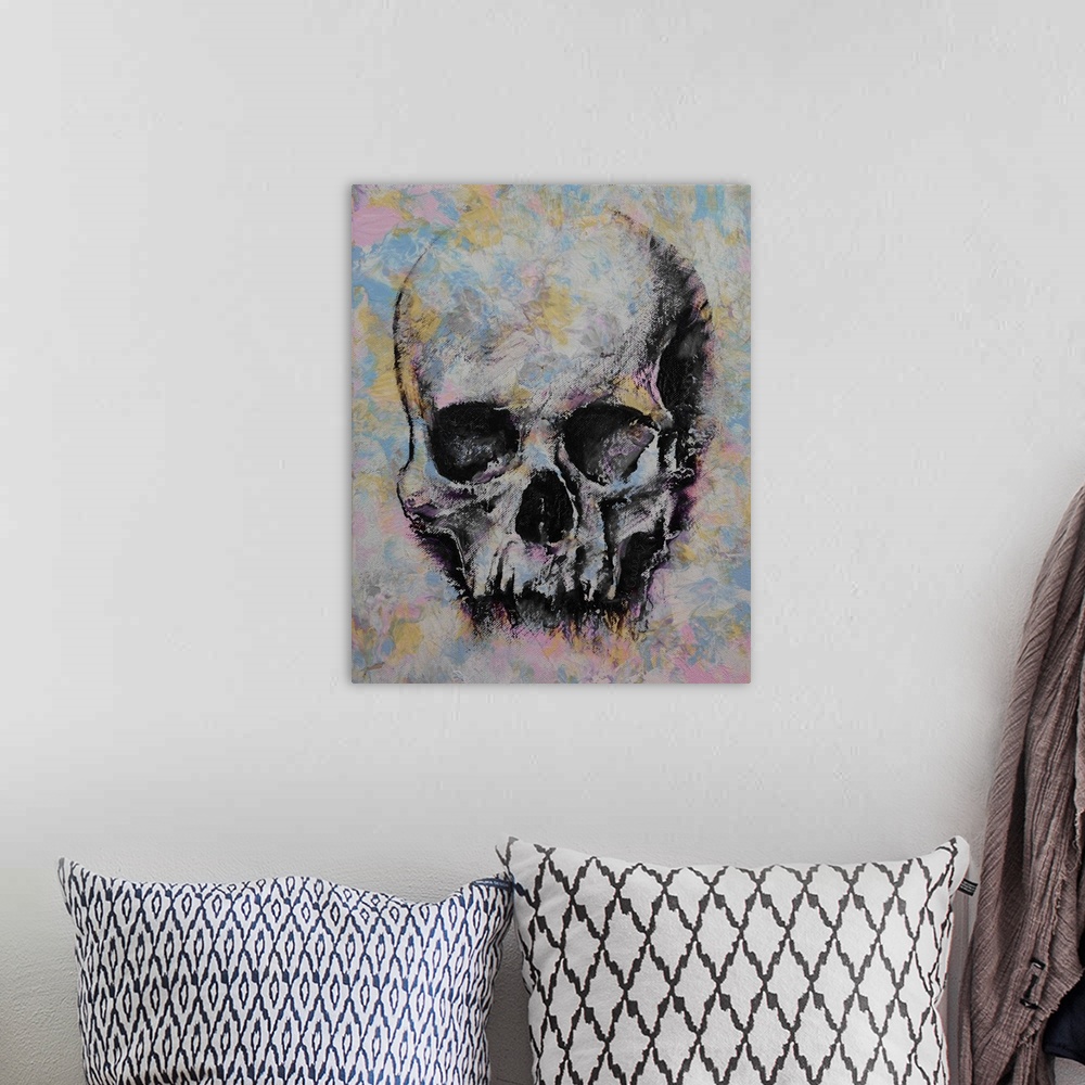 A bohemian room featuring A contemporary painting of a human skull.