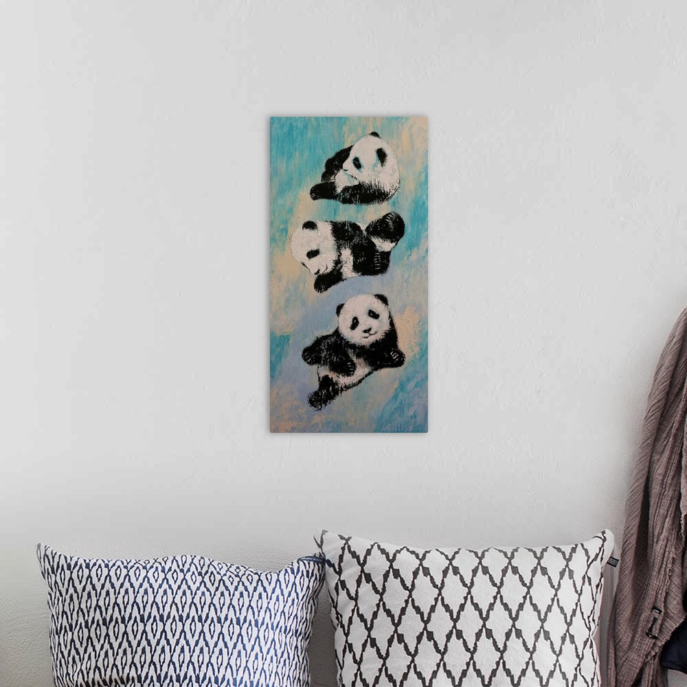 A bohemian room featuring A contemporary painting of three panda bears in karate poses.