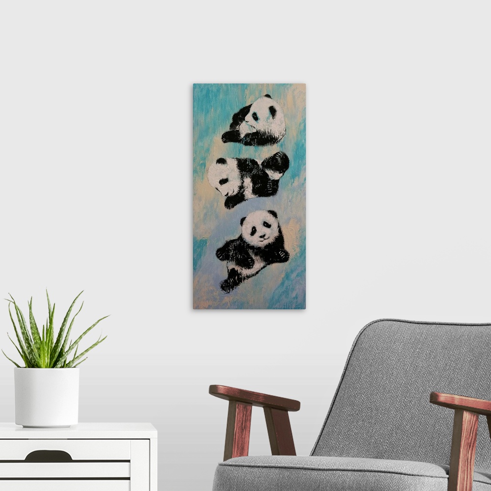 A modern room featuring A contemporary painting of three panda bears in karate poses.