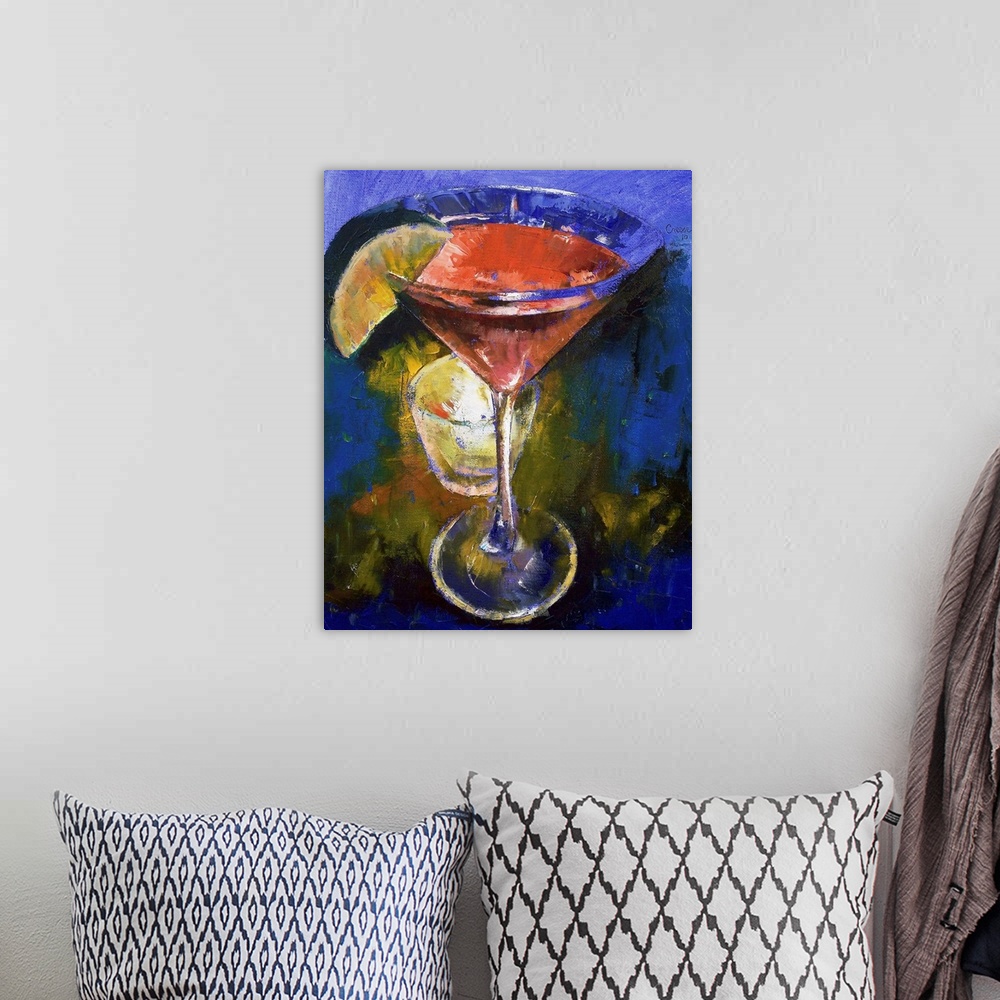 A bohemian room featuring This painting is of a martini glass that is filled with a pink liquid and a lime wedge on the sid...