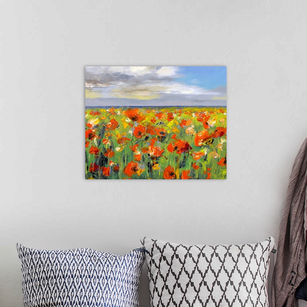 A bohemian room featuring This decorative wall art is a horizontal painting with an endless landscape of wildflowers and cl...