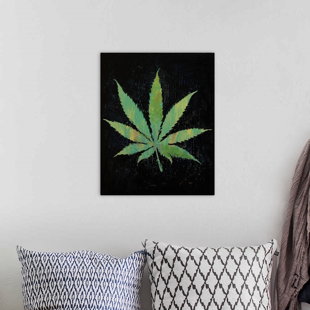 A bohemian room featuring A contemporary painting of a green leaf against a black background.