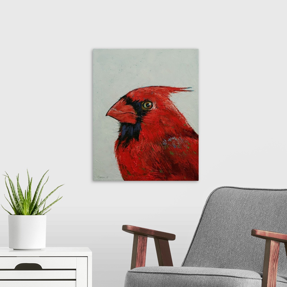 A modern room featuring A contemporary painting of close-up portrait of a striking red cardinal.