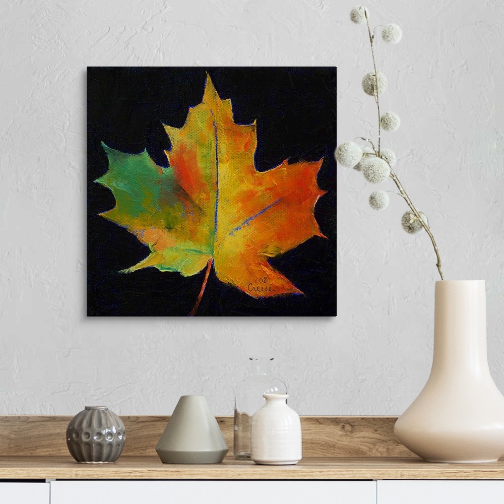 A farmhouse room featuring Square painting on a large canvas of a vibrant, fall colored leaf on a black background.