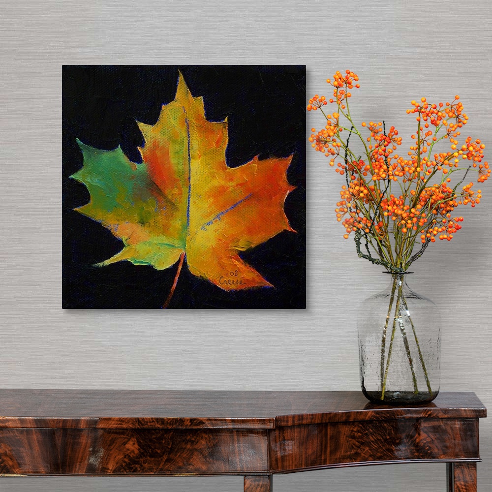A traditional room featuring Square painting on a large canvas of a vibrant, fall colored leaf on a black background.