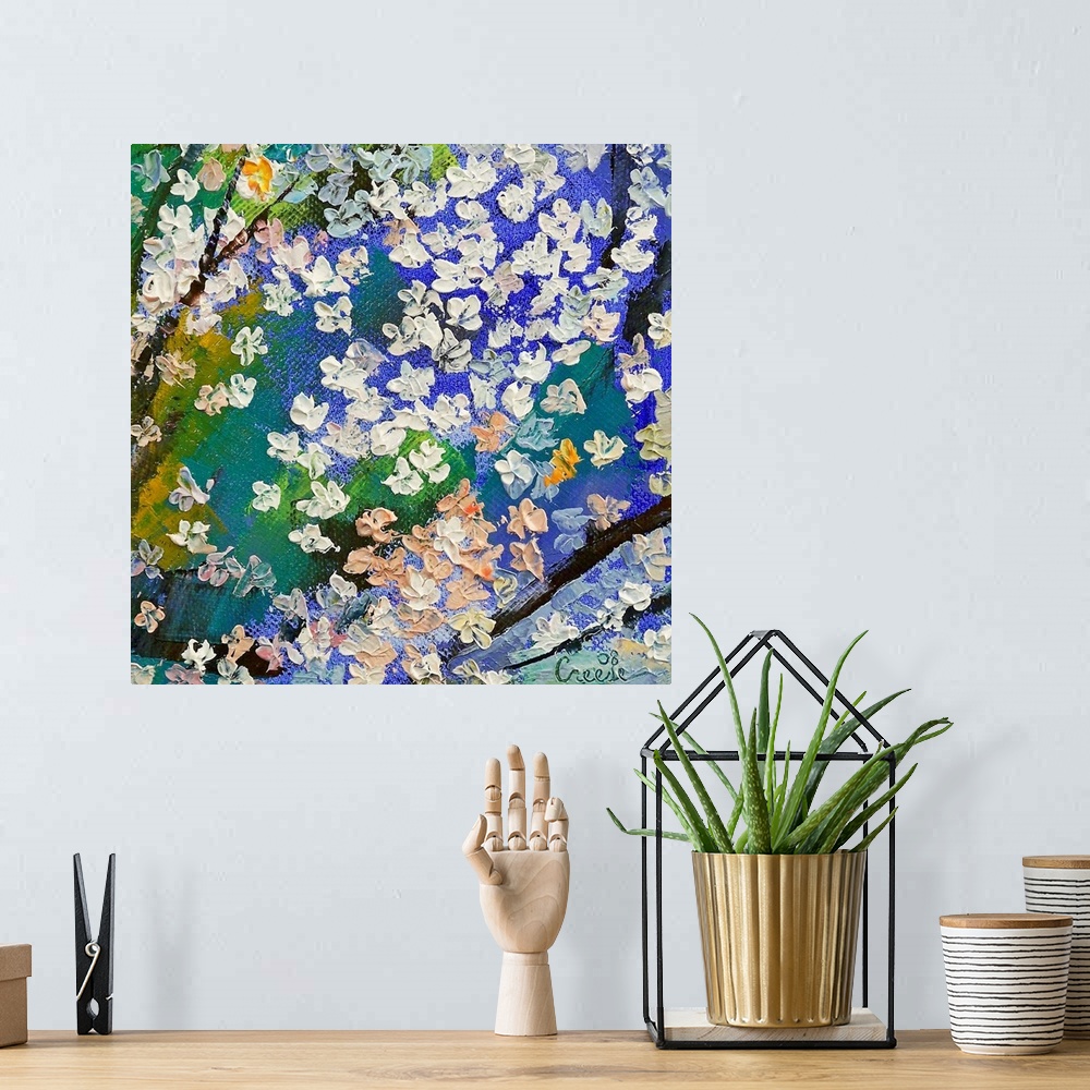 A bohemian room featuring An abstracting paining of tree branches with thick dabs of paint to make the floral blossoms on t...