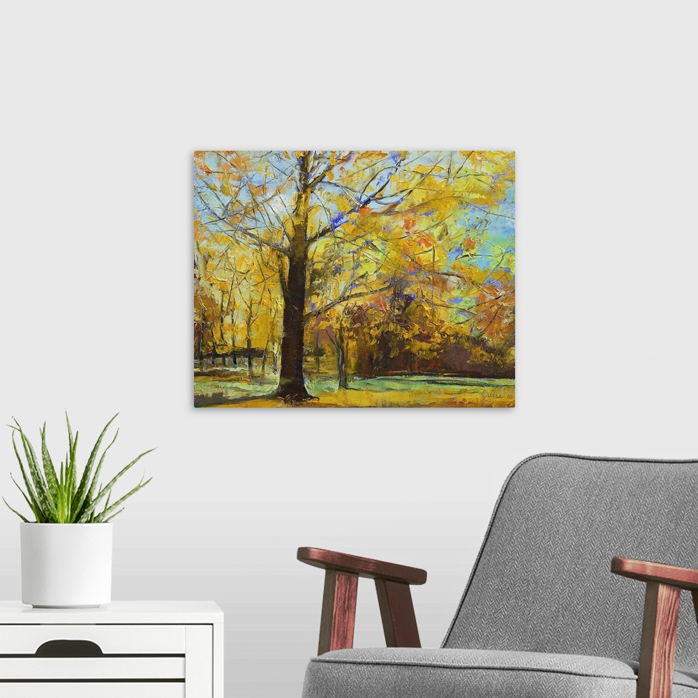 A modern room featuring Large contemporary art depicts a park filled with trees going through the color changes of Fall. ...