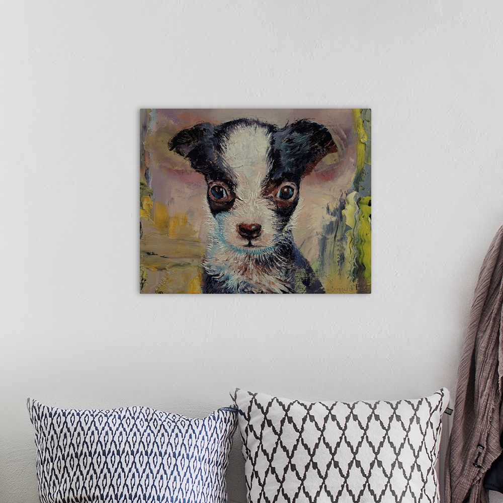 A bohemian room featuring A painting of a black and white puppy.