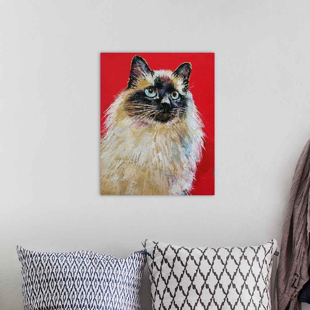 A bohemian room featuring A portrait of a siamese cat with piercing blue eyes.
