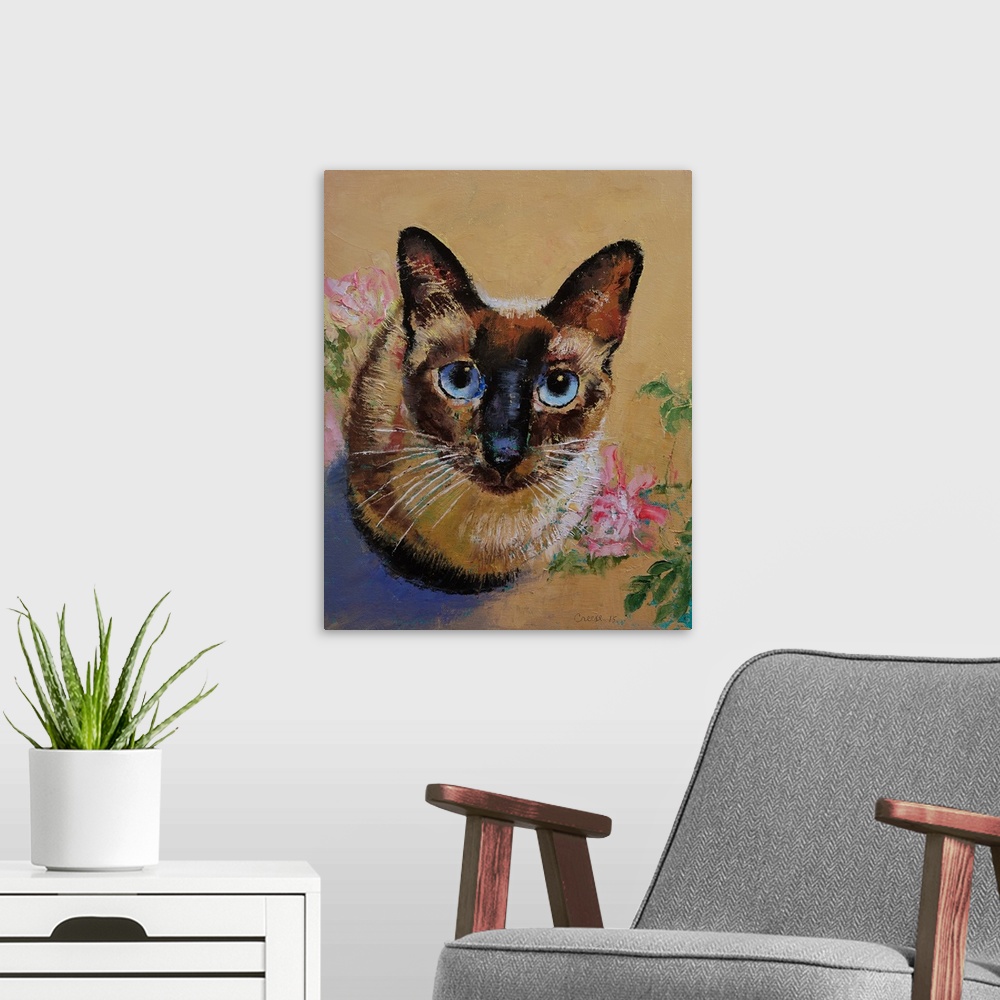 A modern room featuring A siamese cat stares intently with powerful blue eyes.
