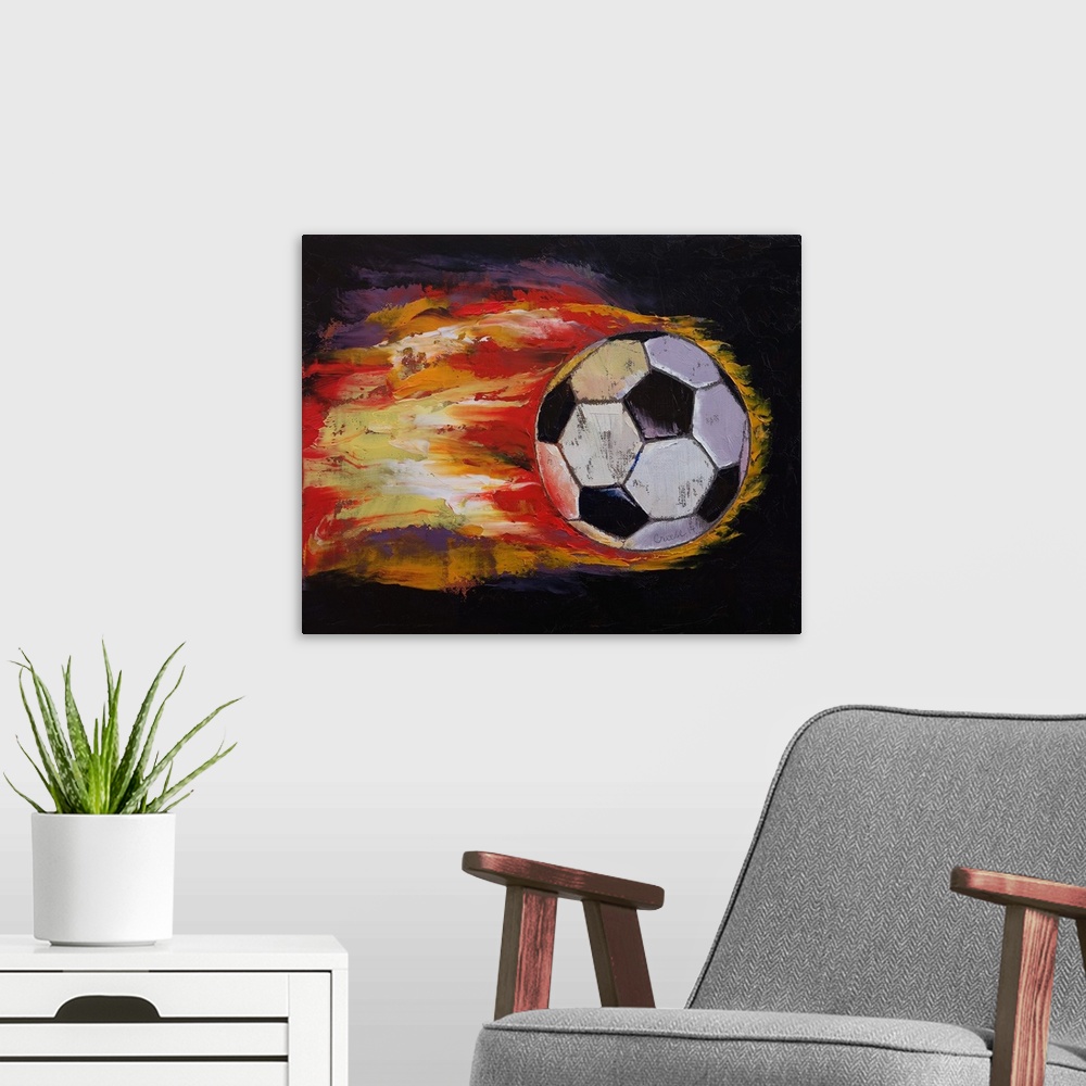 A modern room featuring Contemporary painting of a soccer ball with flames streaming from it.