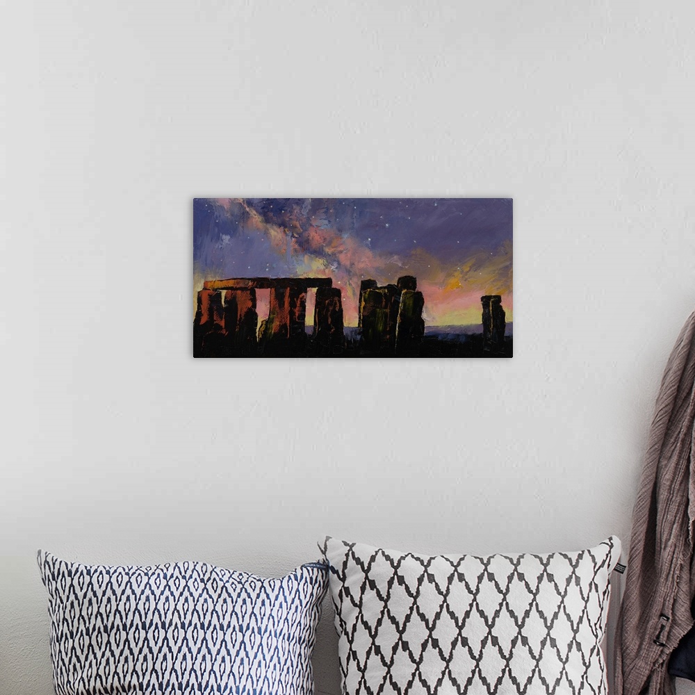 A bohemian room featuring A contemporary painting of a silhouetted Stonehenge under a sunset sky.