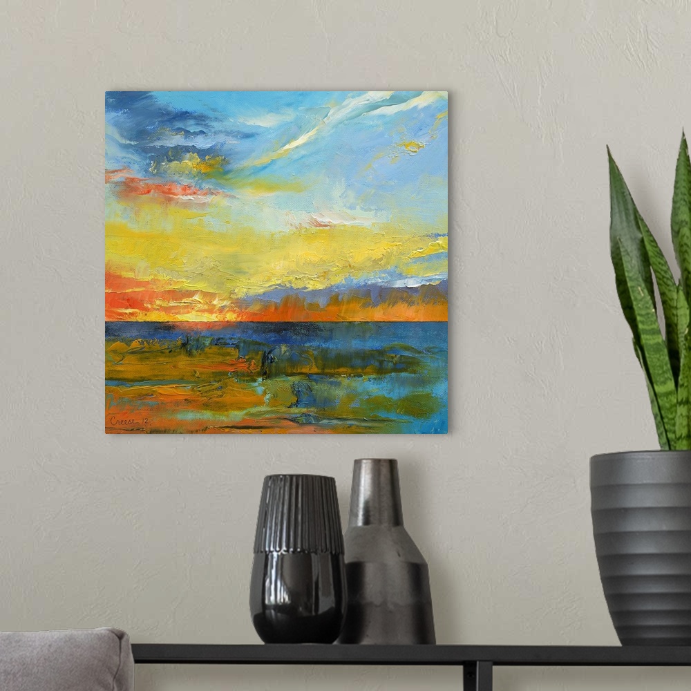 A modern room featuring Contemporary artwork of a sunset with the warmer tone paint used in the water to show reflection.