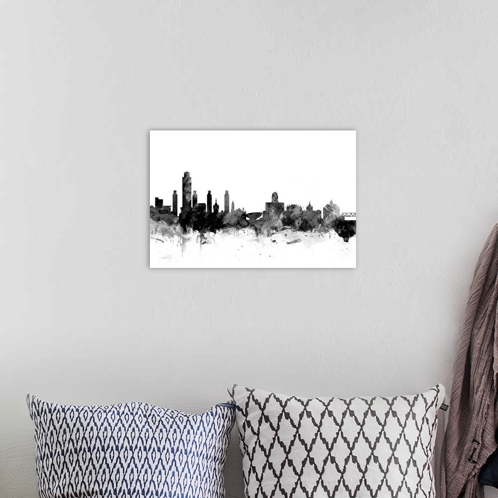 A bohemian room featuring Contemporary artwork of the Albany city skyline in black watercolor paint splashes.