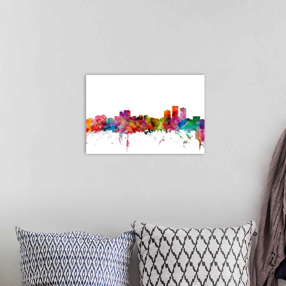 A bohemian room featuring Watercolor artwork of the Anchorage skyline against a white background.