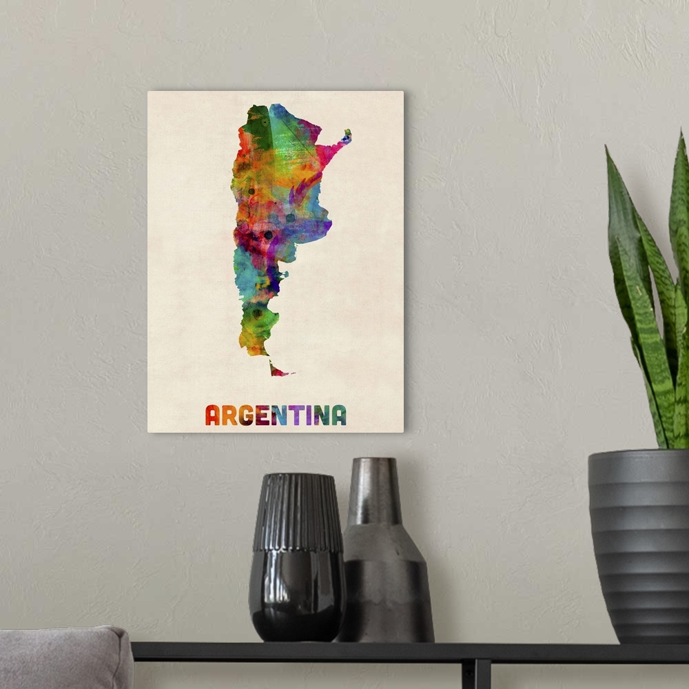 A modern room featuring Contemporary piece of artwork of a map of Argentina made up of watercolor splashes.