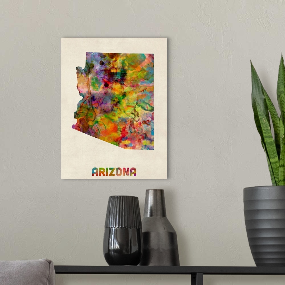 A modern room featuring Contemporary piece of artwork of a map of Arizona made up of watercolor splashes.