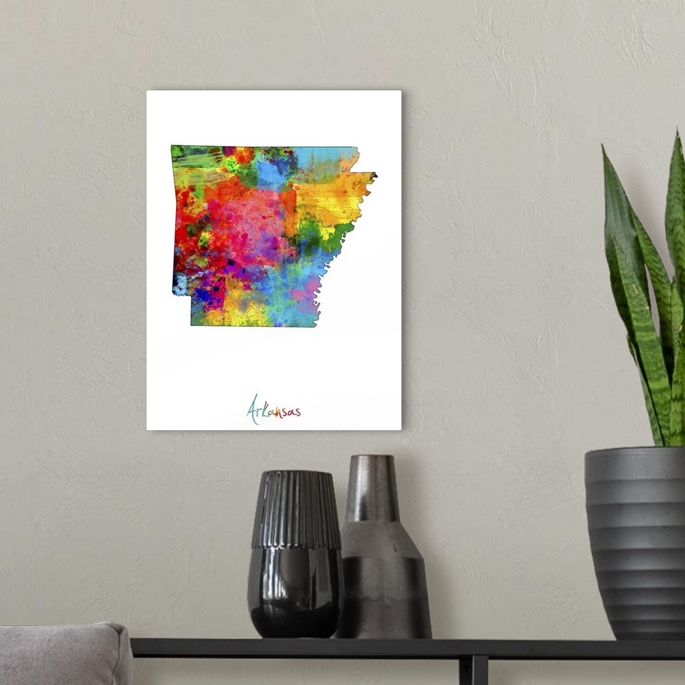 A modern room featuring Contemporary artwork of a map of Arkansas made of colorful paint splashes.