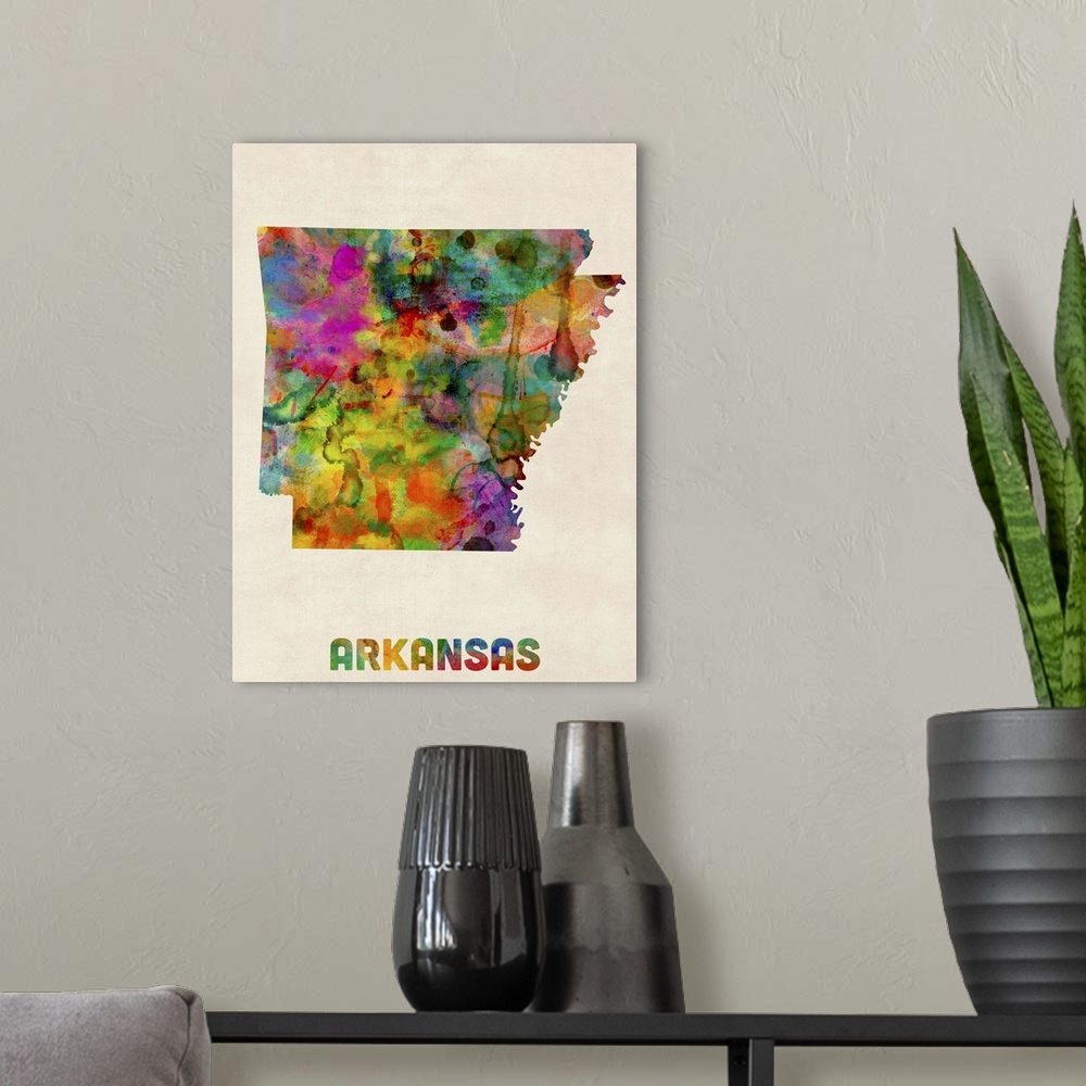 A modern room featuring Contemporary piece of artwork of a map of Arkansas made up of watercolor splashes.