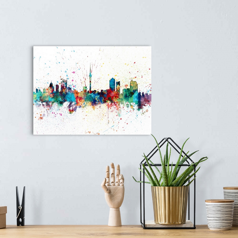A bohemian room featuring paint splashes art print of the skyline of Auckland, New Zealand