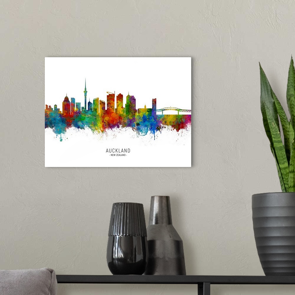 A modern room featuring Watercolor art print of the skyline of Auckland, New Zealand.