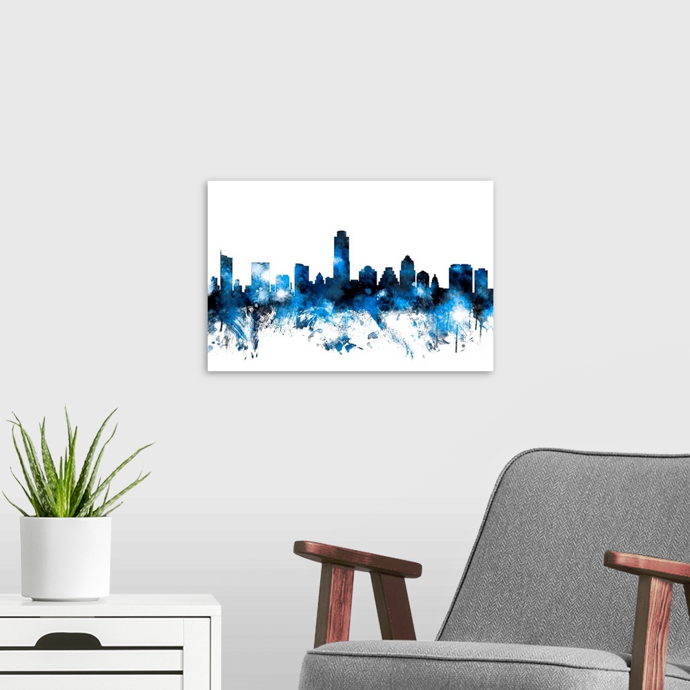 A modern room featuring Contemporary piece of artwork of the Austin skyline made of colorful paint splashes.