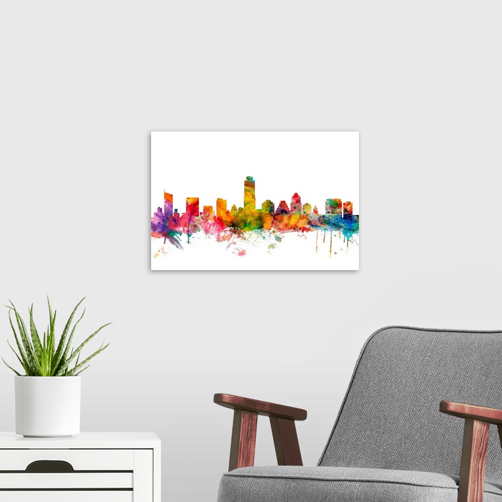 A modern room featuring Watercolor artwork of the Austin skyline against a white background.