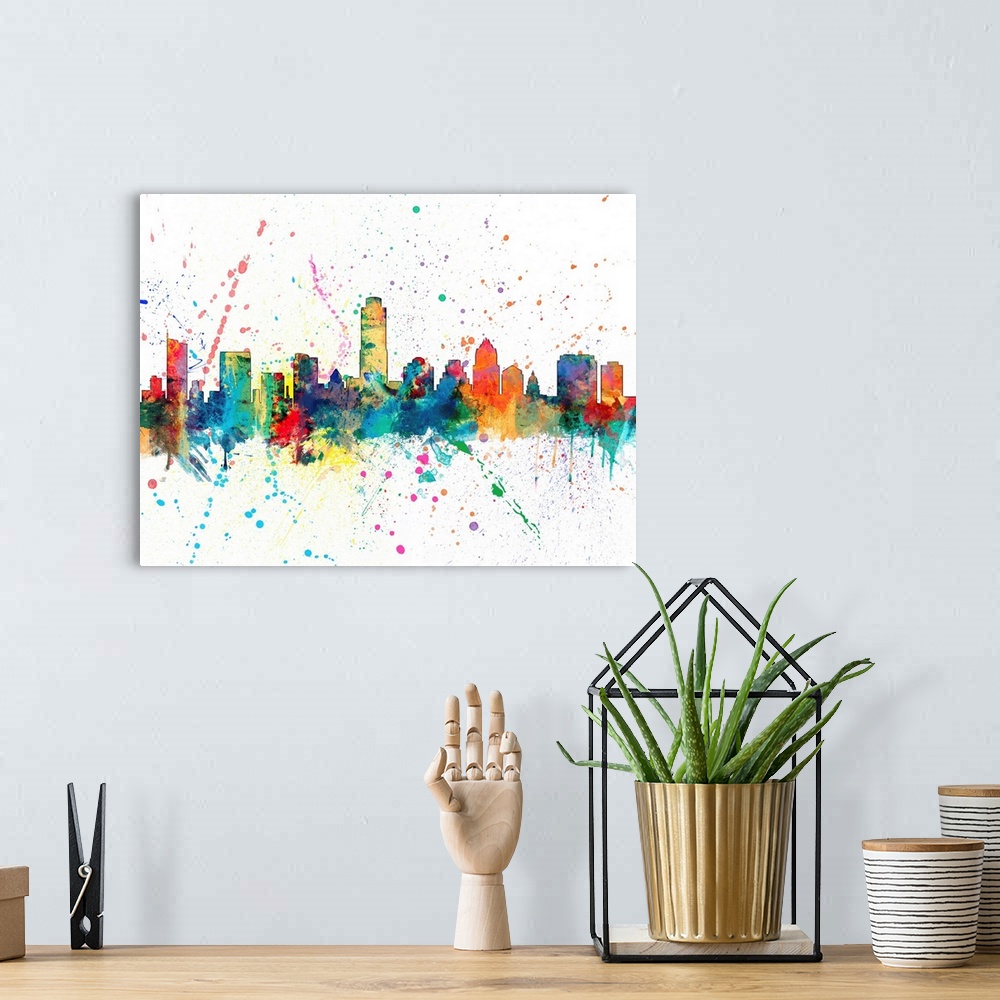 A bohemian room featuring Wild and vibrant paint splatter silhouette of the Austin skyline.