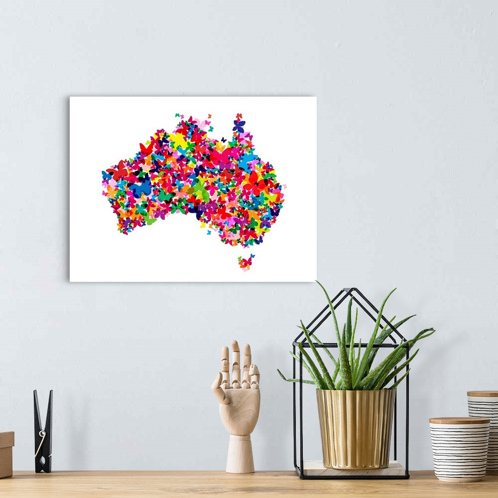 A bohemian room featuring Contemporary piece of artwork of a map of Australia made of colorful butterflies.