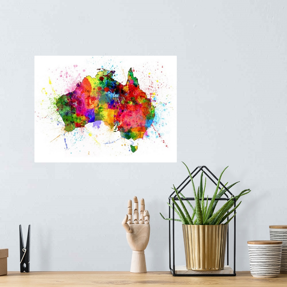 A bohemian room featuring Contemporary artwork of a map of the country Australia made of colorful paint splashes.