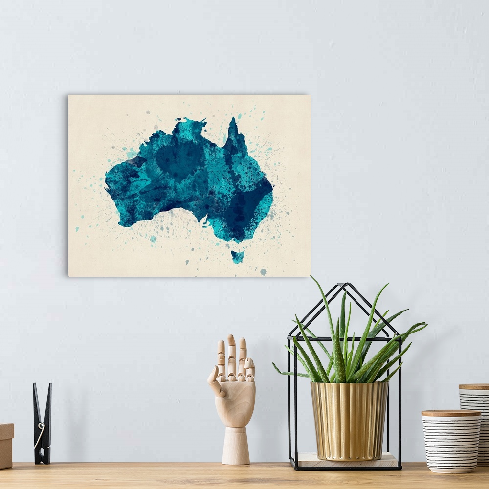 A bohemian room featuring Contemporary artwork of a map of the country Australia made of colorful paint splashes.