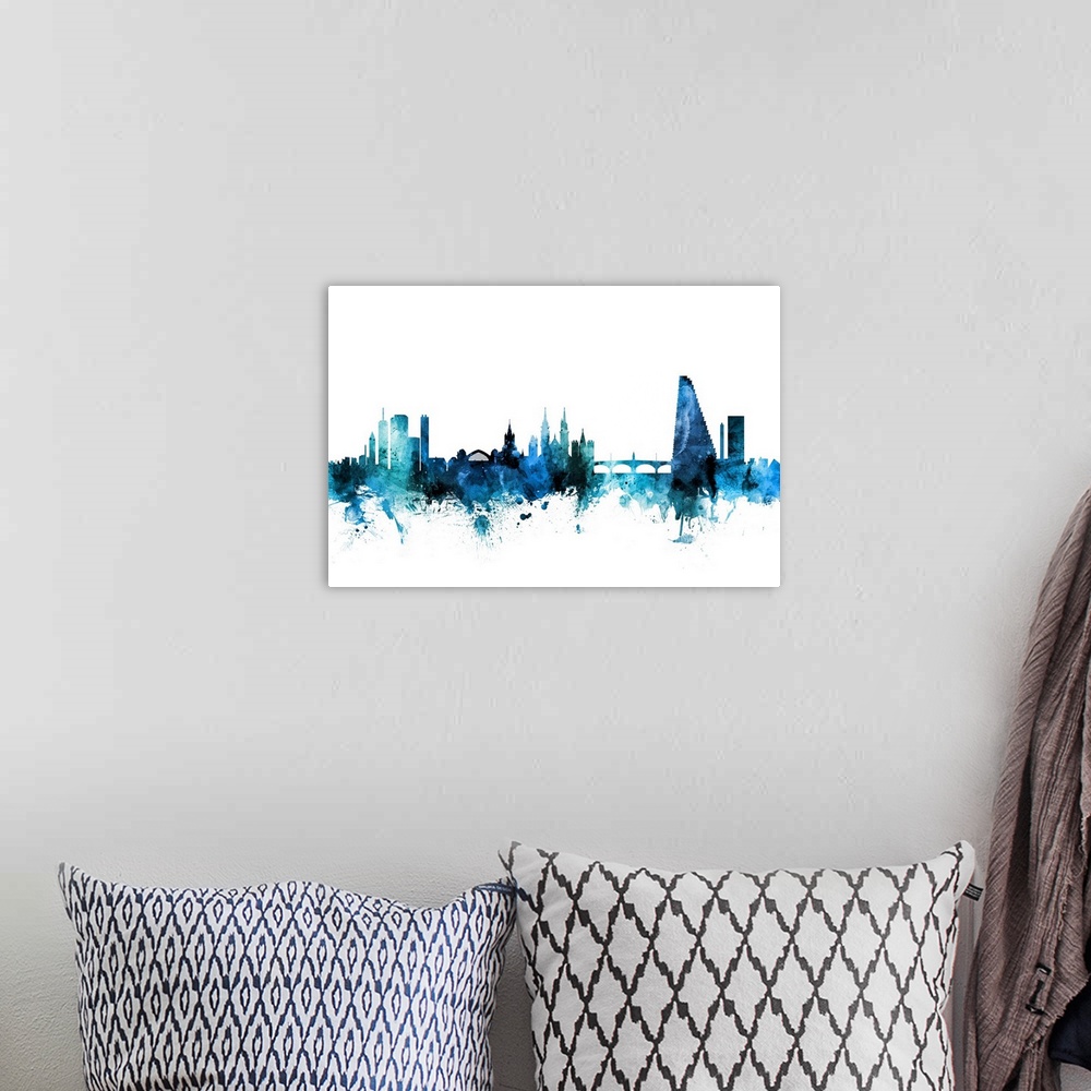 A bohemian room featuring Watercolor art print of the skyline of Basel, Switzerland.