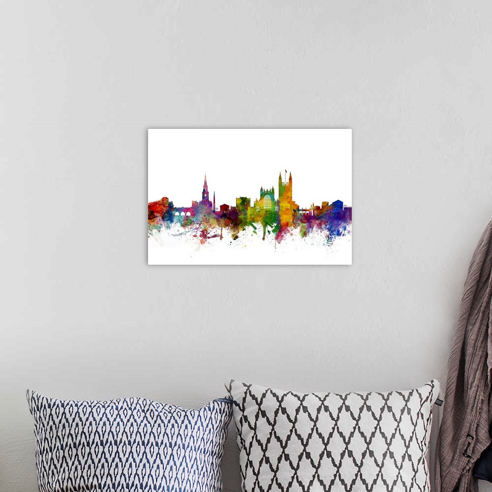 A bohemian room featuring Colorful watercolor splattered silhouetted of the Bath city skyline.