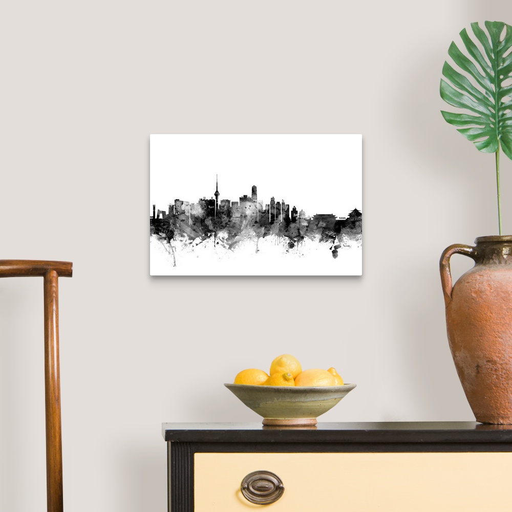 A traditional room featuring Contemporary artwork of the Beijing city skyline in black watercolor paint splashes.