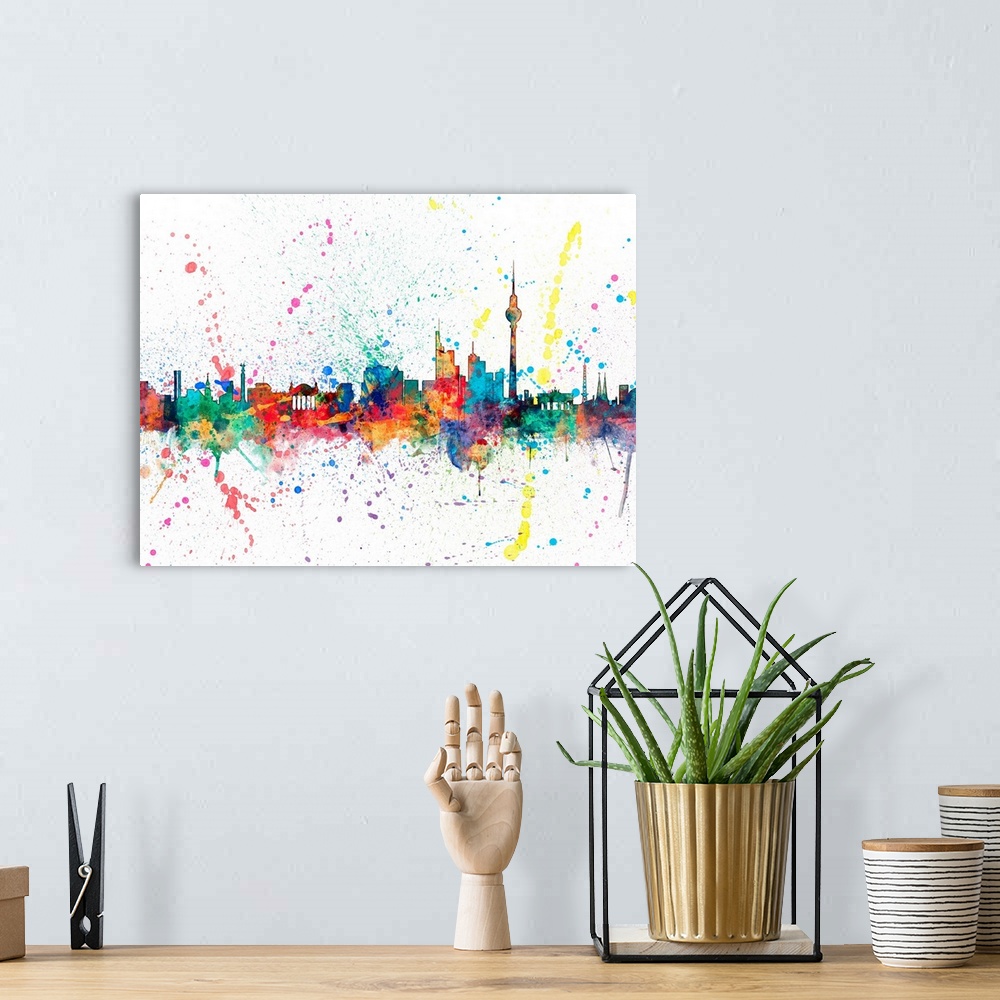 A bohemian room featuring Wild and vibrant paint splatter silhouette of the Berlin skyline.