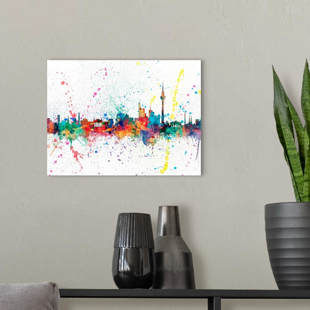 A modern room featuring Wild and vibrant paint splatter silhouette of the Berlin skyline.