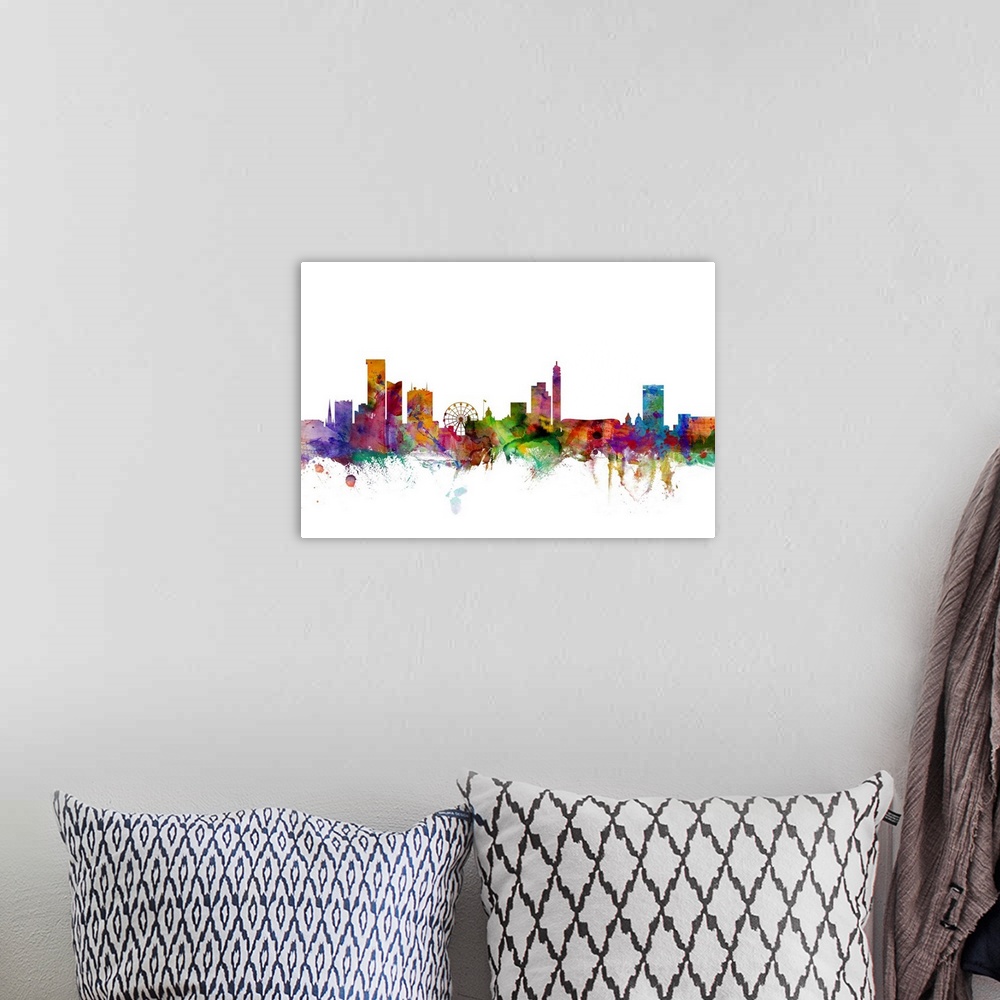 A bohemian room featuring Contemporary piece of artwork of the Birmingham, England skyline made of colorful paint splashes.