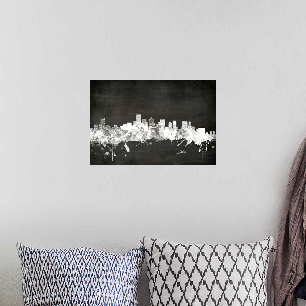 A bohemian room featuring Smokey dark watercolor silhouette of the Boston city skyline against chalkboard background.