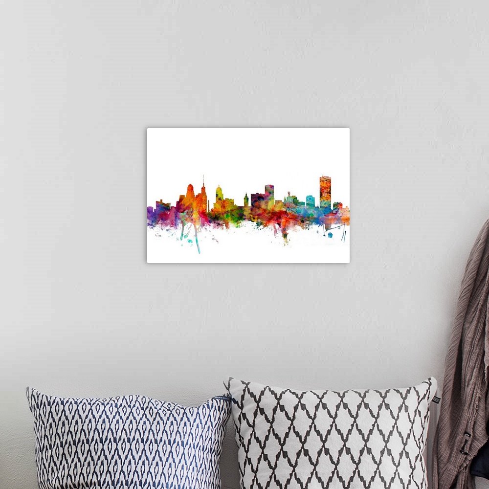 A bohemian room featuring Watercolor artwork of the Buffalo skyline against a white background.