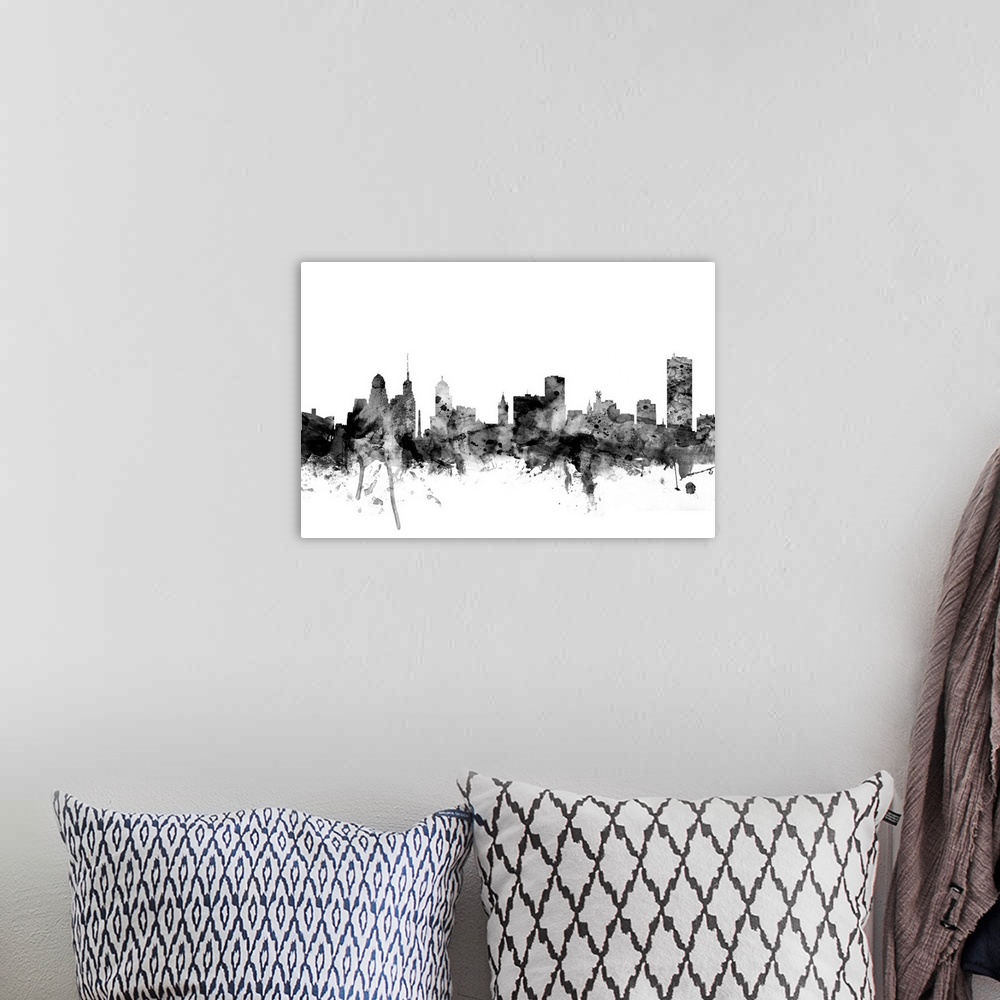 A bohemian room featuring Contemporary artwork of the Buffalo city skyline in black watercolor paint splashes.