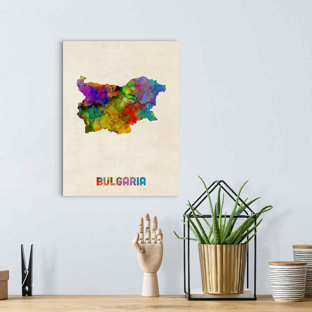 A bohemian room featuring A watercolor map of Bulgaria.