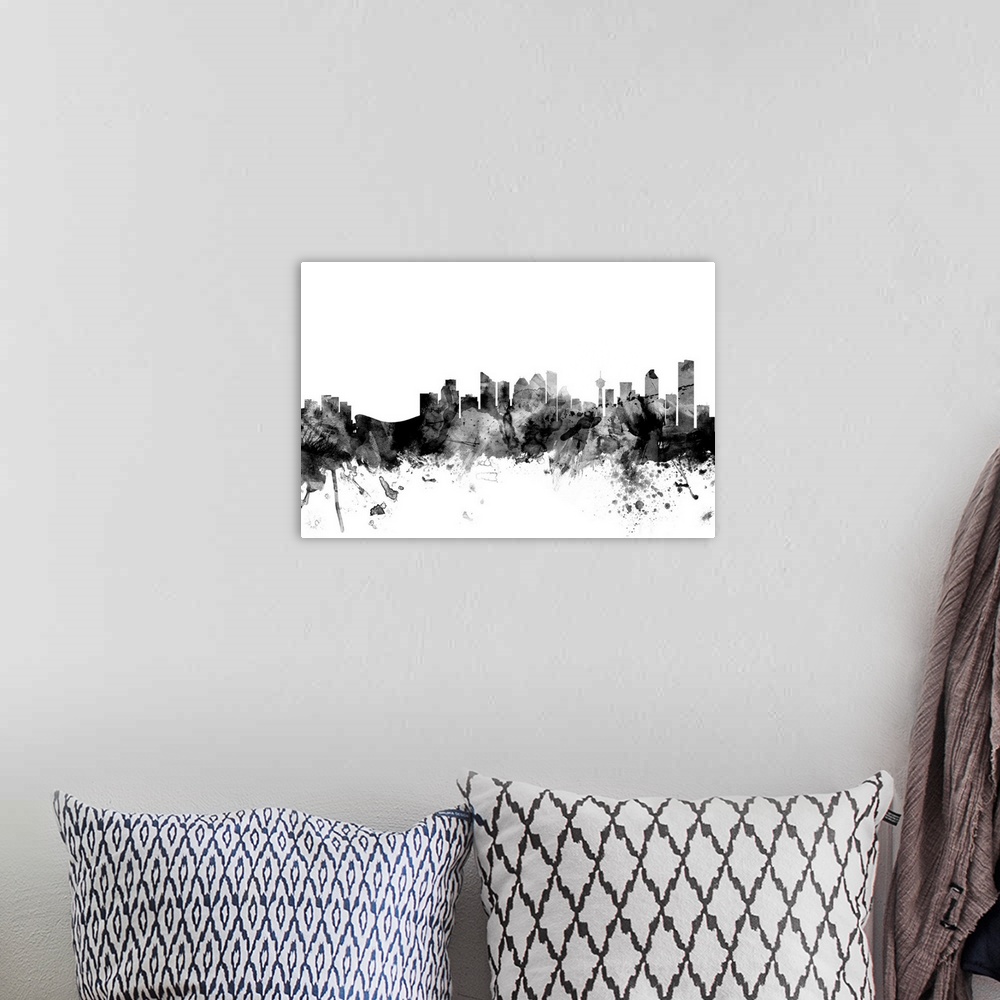 A bohemian room featuring Contemporary artwork of the Calgary city skyline in black watercolor paint splashes.