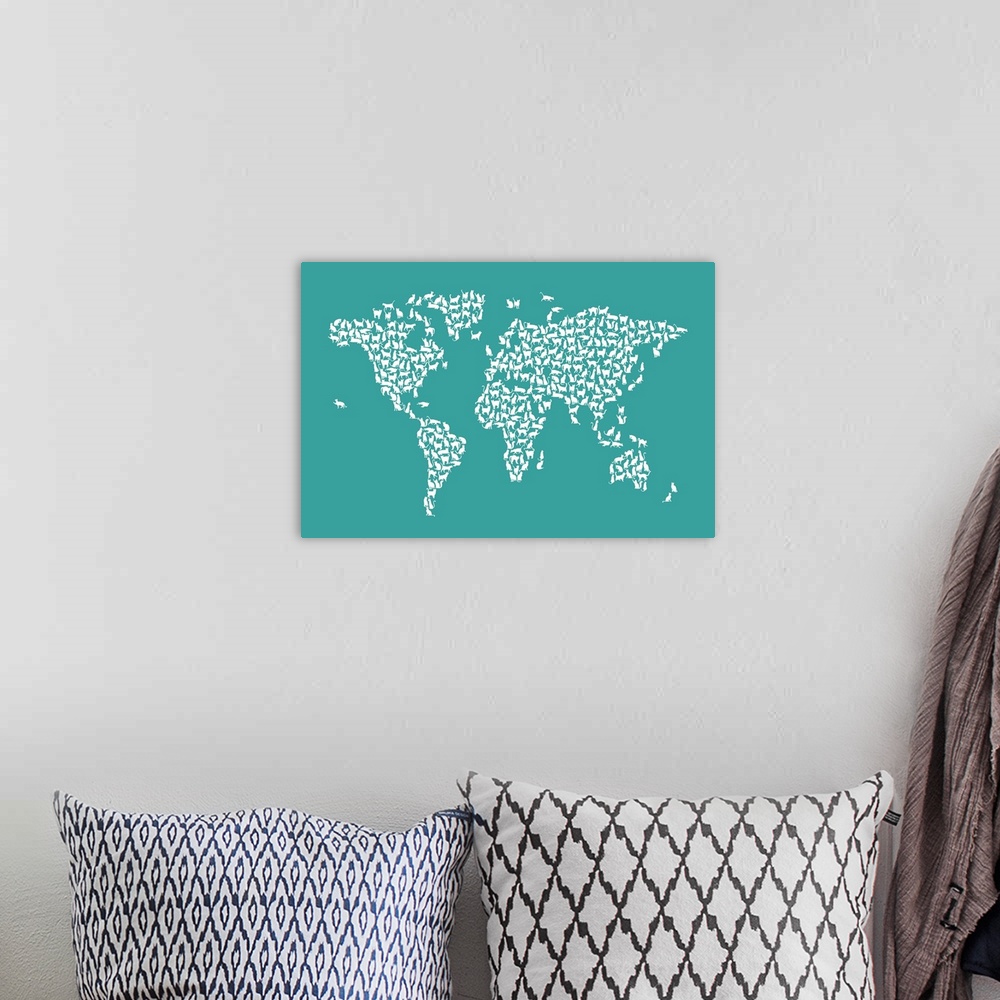 A bohemian room featuring A map of the world made from silhouettes of cats.