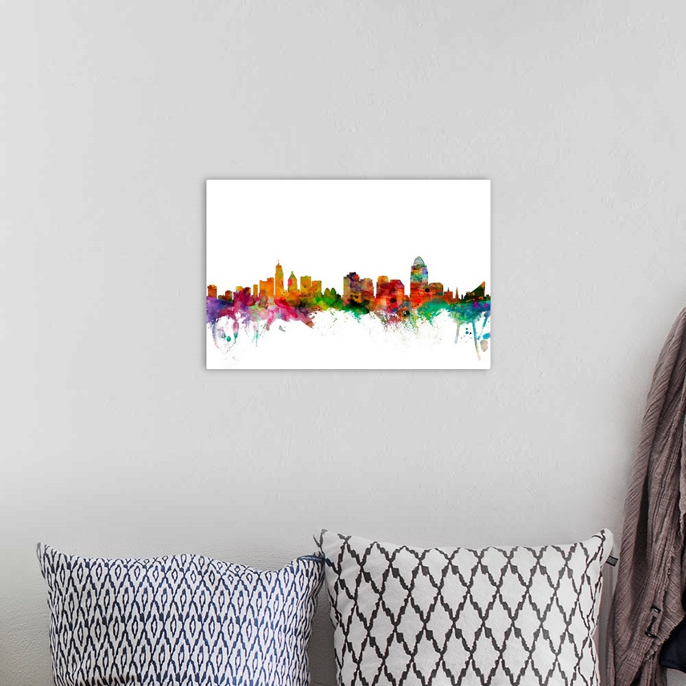 A bohemian room featuring Watercolor artwork of the Cincinnati skyline against a white background.