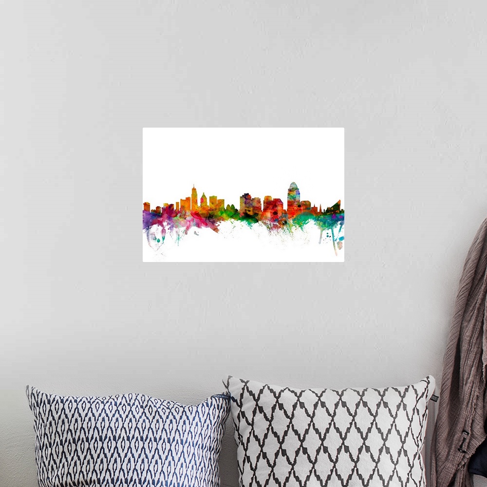 A bohemian room featuring Watercolor artwork of the Cincinnati skyline against a white background.